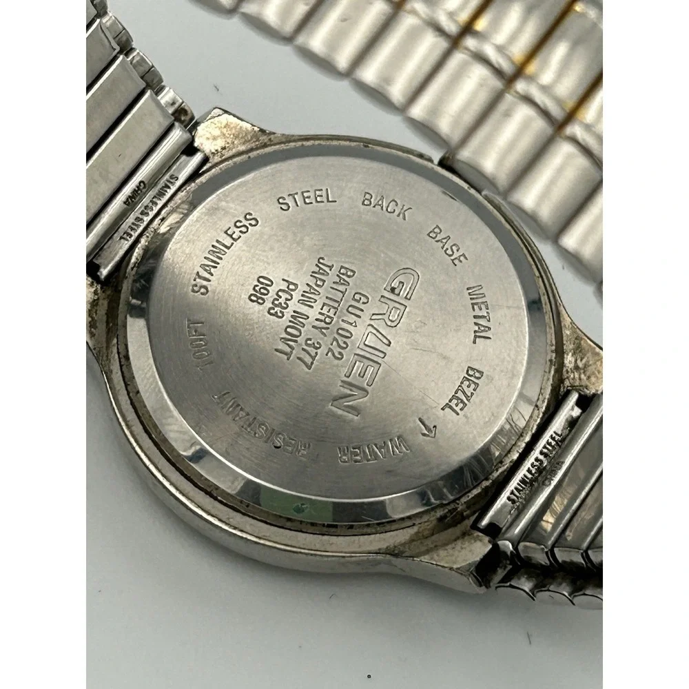 Gruen men's watch GU1022 Blue Face Stainless Steel And Gold Stretch Band Read